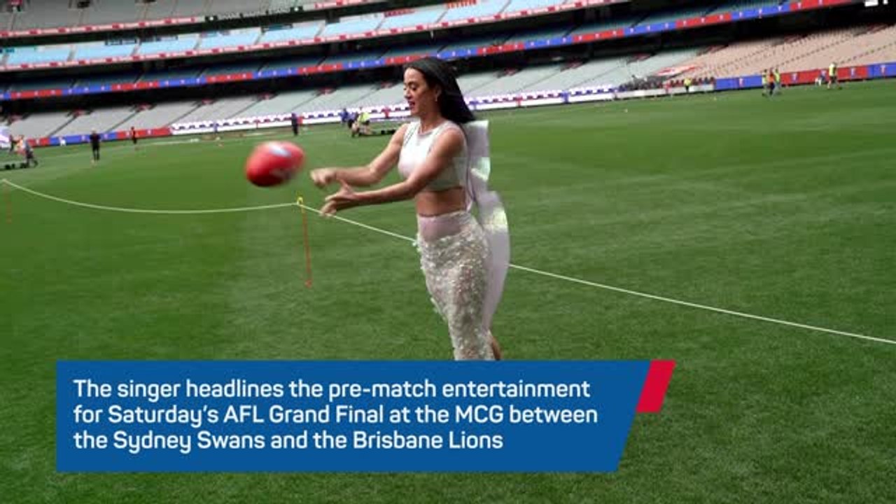 Roar talent: Katy Perry tests her Aussie Rules skills ahead of AFL Grand Final performance