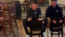 Comical footage of two brothers racing on broken chairs with an epic fail at the end