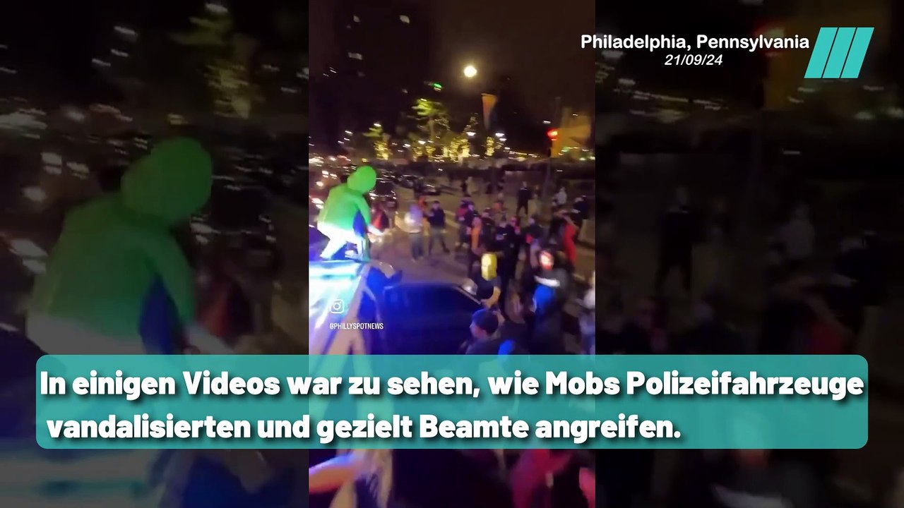 Menge umzingelt Polizeiauto bei illegaler Straße Übernahme