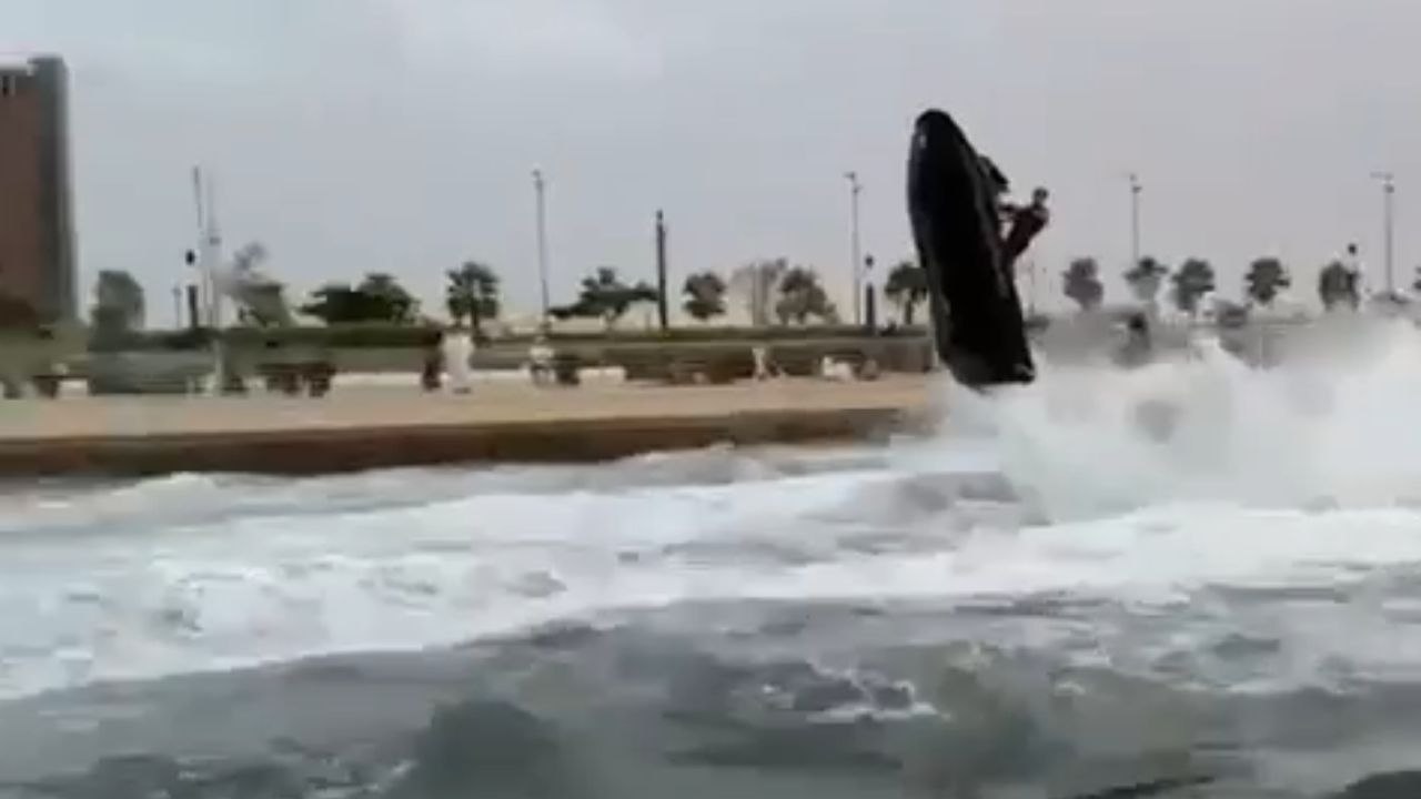 Thrilling jet-ski ride ends in a splash after unexpected collision with a wave