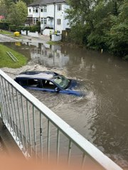 Northfield in Birmingham badly hit by floods - driver climbs onto roof of car to escape rising water