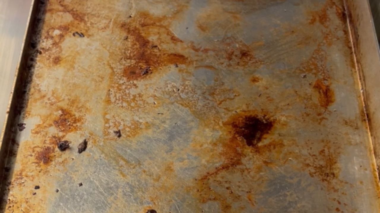 Man restores his griddle to its original shine with simple cleaning steps