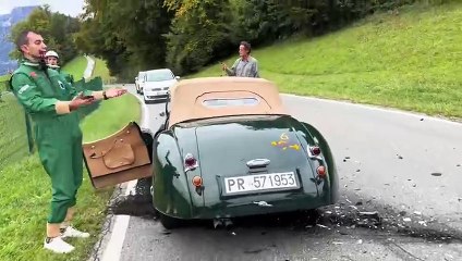 A woman on the phone and not paying attention to the road drove into a 1948 Jaguar XK120