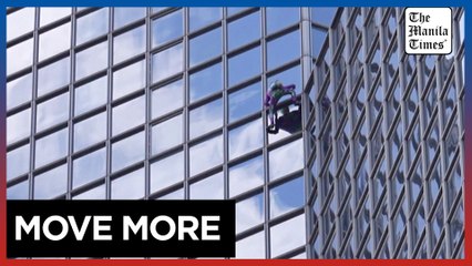 'French Spiderman' climbs skyscraper to entice people to do more sport