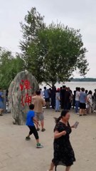 “Chillin’ at the park turned into a wild splash zone! Watch everyone scramble as the river water surprises them, and try not to laugh! #ParkDayGoneWrong #UnexpectedSplash #TooFunny”