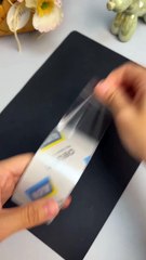 Creating a mini lantern using transparent tape and small wooden Continue bu