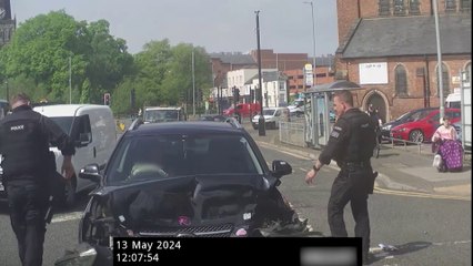 Driver crashes into back of police car