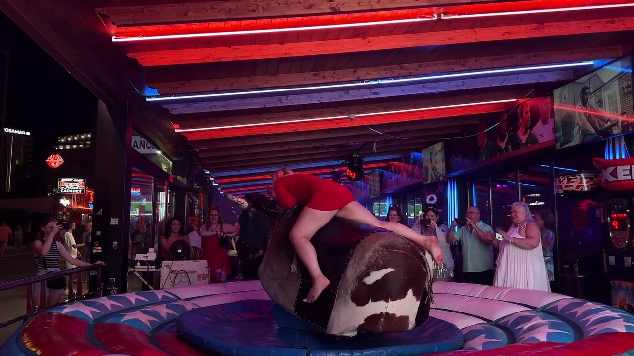 WATCH THIS!  Pretty Girl EPIC FAIL on a Mechanical Bull in Benidorm!