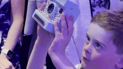 Boy, 5, takes polaroids for £2 a pop to raise money for school defibrillator