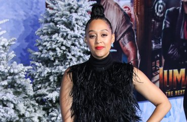 Tia Mowry stopped dating because the men she met had held on to an "infatuation" from her 'Sister, Sister' days