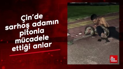 Çin'de sarhoş adamın pitonla mücadele ettiği anlar
