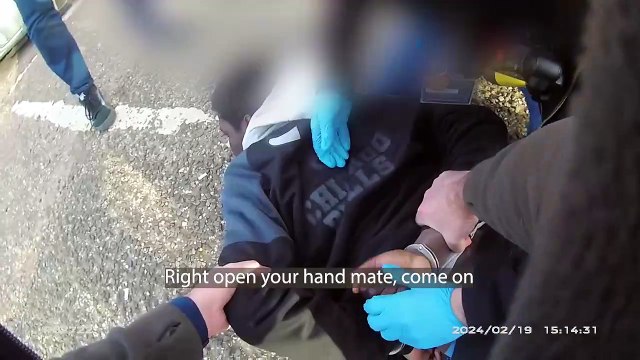 Has he had his hands down the back of his pants -Arrest of drug dealer