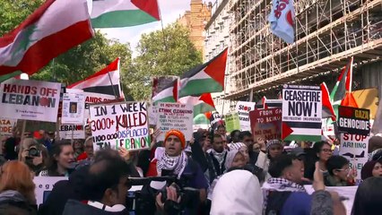 Pro-Palestinian activists lead a march through London