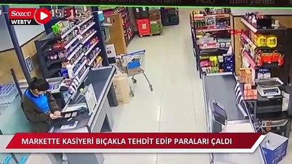 Markette kasiyeri bıçakla tehdit edip paraları gasp anı güvenlik kamerasına yansıdı