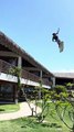 Person jumps from the balcony and starts kitesurfing in the swimming pool!