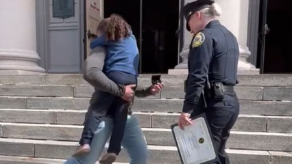 Double celebration: Police academy graduate gets engaged right after graduation