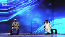 Pakistani TikTok star Basit Rind asks a question to Zakir Naik in Karachi.