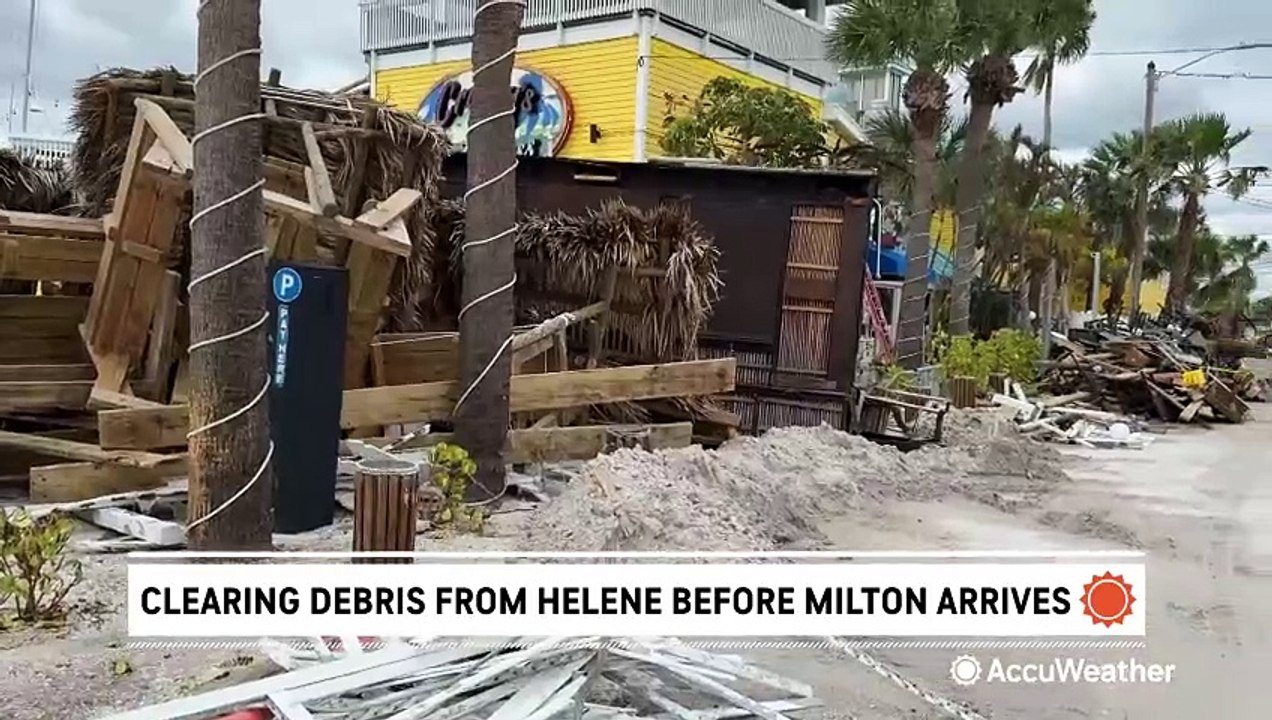 Mountains of sand and debris still remain in Fl...