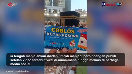 Jamaah Umroh Bawa Kertas Bertuliskan "Coblos Kotak Kosong"
