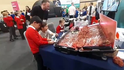 Watch as thousands of children enjoy STEMFest at the Beacon of Light