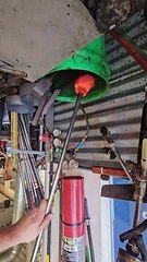 Glass artists are making an adorable glass octopus in their hot shop!