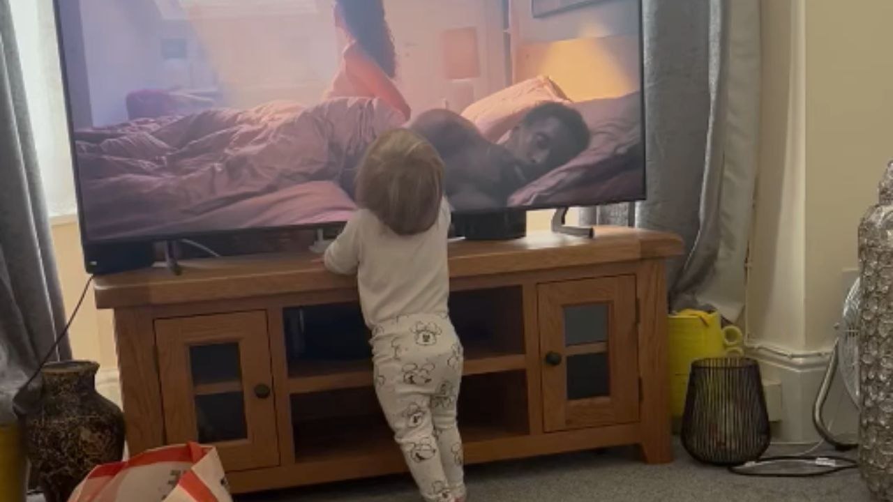 Toddler's confused reaction after getting caught touching the TV is PURE COMEDY!