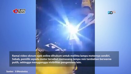 BIKIN SILAU PENGENDARA LAIN, OKNUM OJOL INI DIHUKUM PELOTOTI LAMPU MOTORNYA SENDIRI