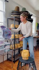 Hat maker is demonstrating traditional millinery techniques!