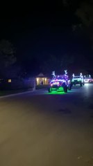 Kids Enjoy Parade of Jeeps Decorated With LED Lights For Christmas