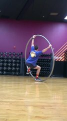 Man Shows His Skills on Cyr Wheel