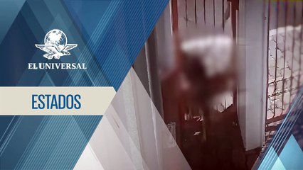 Imperdonable  sujeto golpea a perrito atorado en una reja en Puebla