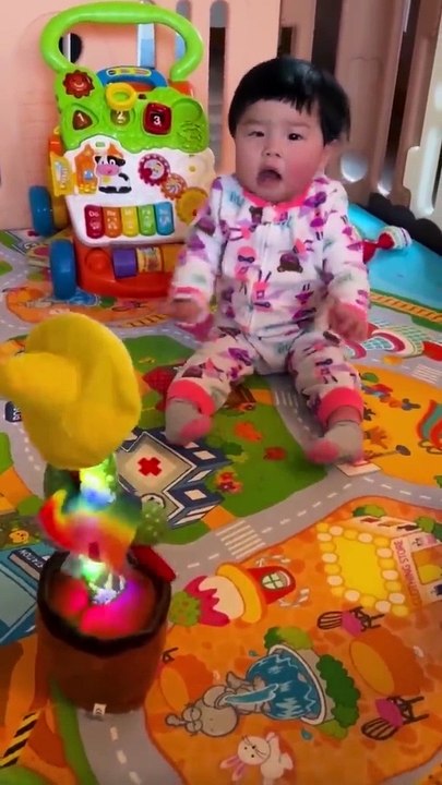 Babies play dancing cactus toy. Cutest baby funniest moments.