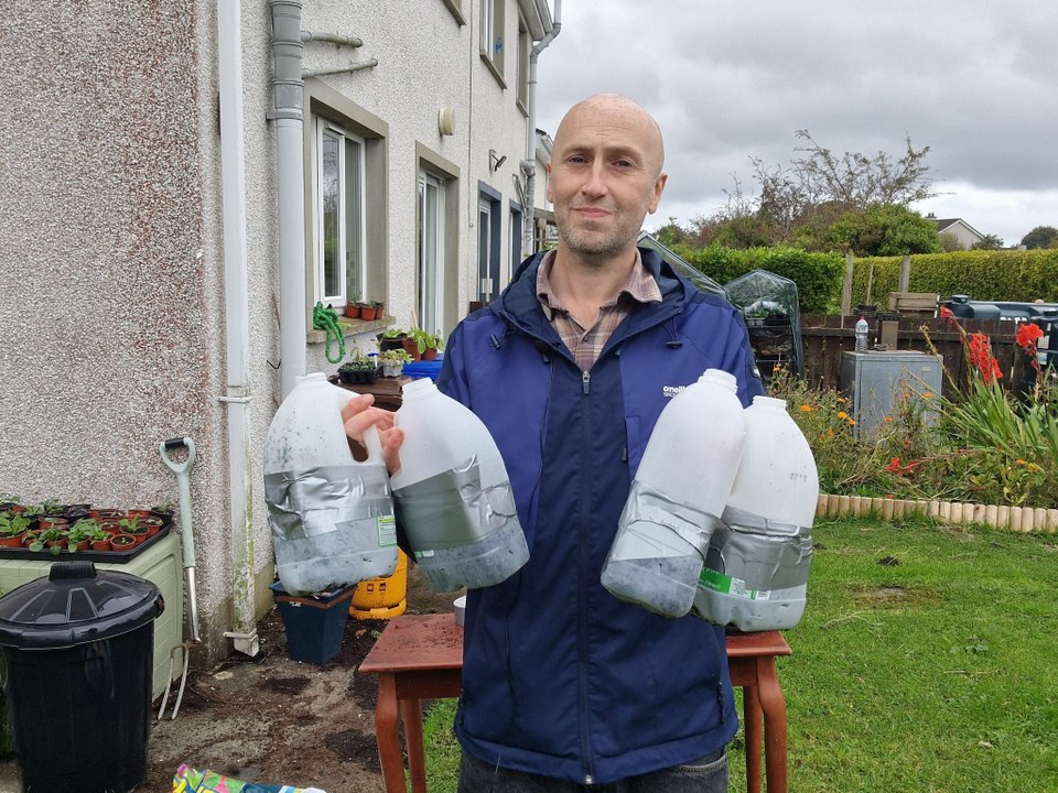 Winter sowing method using milk jug containers - Gardening with Brendan