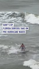 Surfers brave pre-hurricane waves in Florida