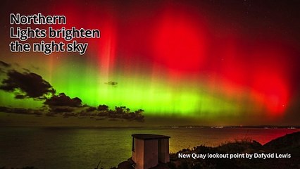 Northern Lights brighten night sky along Cardigan Bay