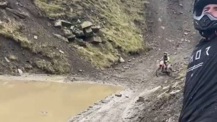 Fearless rider chooses heart over brain to attempt HUGE hill jump!