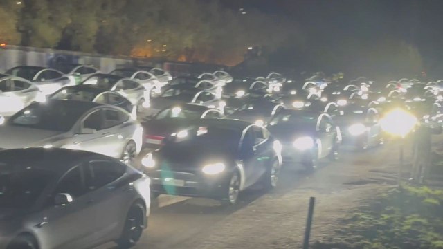 Unbelievable Tesla Light Show in Finland features a sea of cars flashing lights in sync with music beats