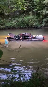 Truck Submerges In Pond