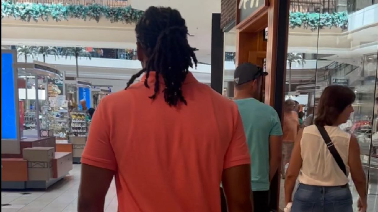 Tears and smiles: Son welcomes father after 8 years behind bars