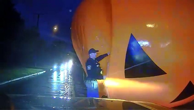 Police officer ‘swallowed’ by huge inflatable pumpkin