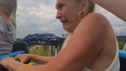 Woman records mom after tricking her into experiencing an intense water ride