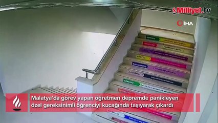 Depremde panikleyen öğrenciyi kucaklayarak dışarı çıkardı