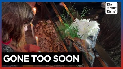 Fans light candles to mourn One Direction's Liam Payne