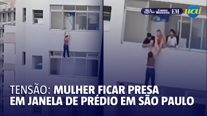 Mulher fica pendurada em janela de prédio no Guarujá