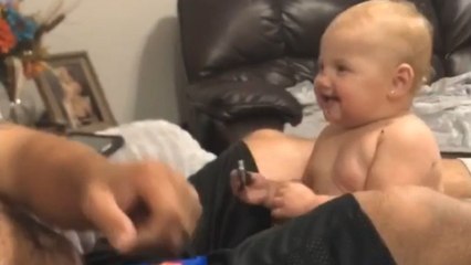Little girl eagerly anticipates her next Oreo cookie while holding one in her hand