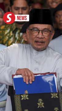 Anwar arrives at Parliament to table Budget 2025