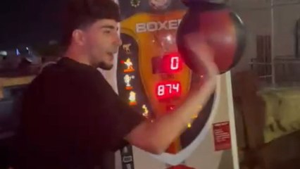 Comical fail as boy misses punching bag and drops his glasses mid-attempt