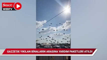 Gazze'de yıkılan binaların arasına yardım paketleri atıldı