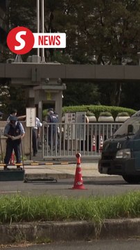 Man arrested after throwing suspected Molotov cocktails at Japan's ruling party headquarters