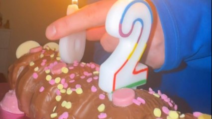 Cute birthday moment as boyfriend's candle placement adds unexpected humor to celebration